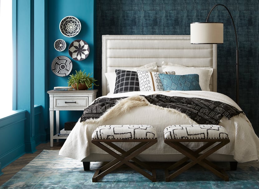 bedroom-scene-turquoise-walls-cloth-headboard