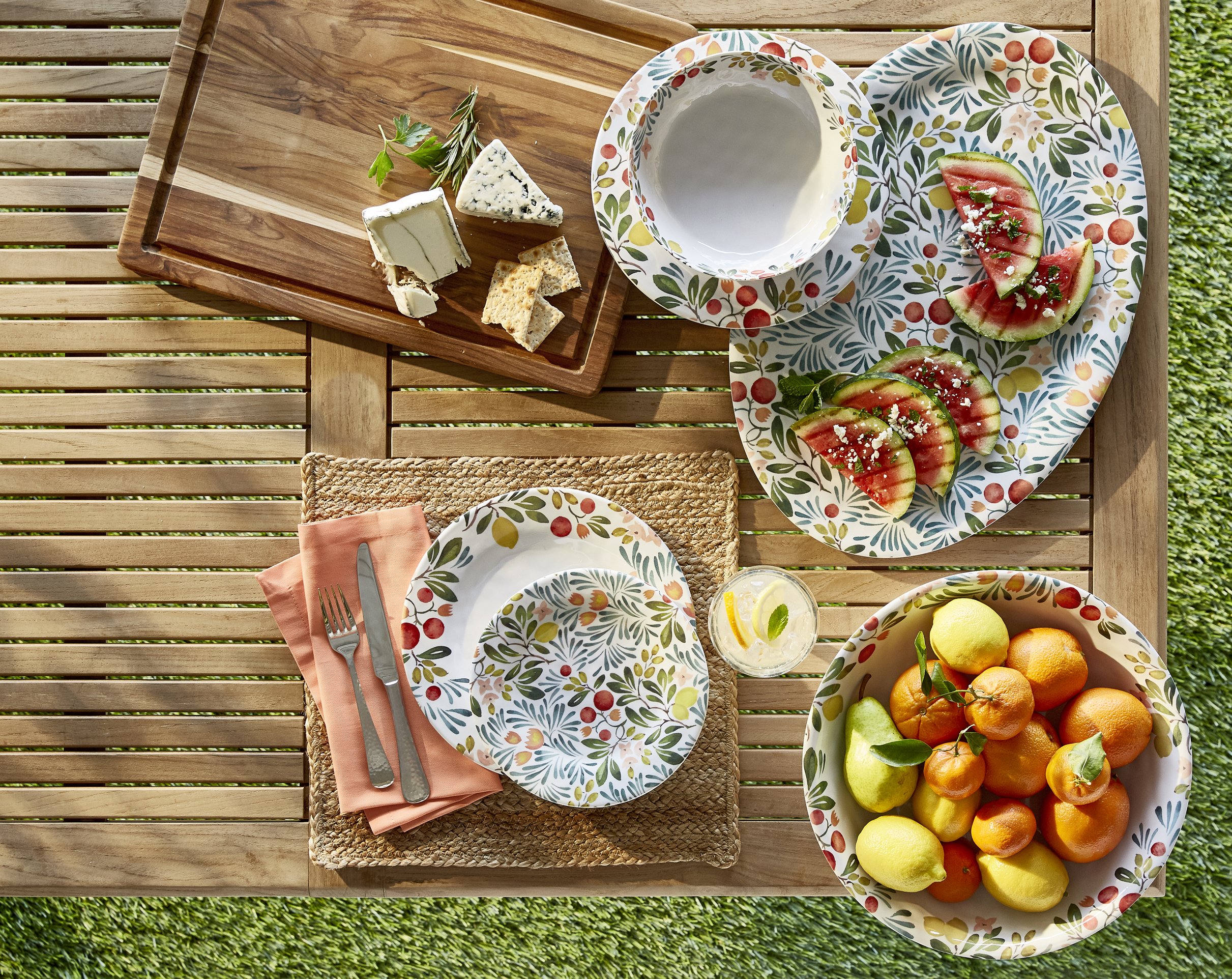 cheese-board-fruit-bowl-on-outdoor-table