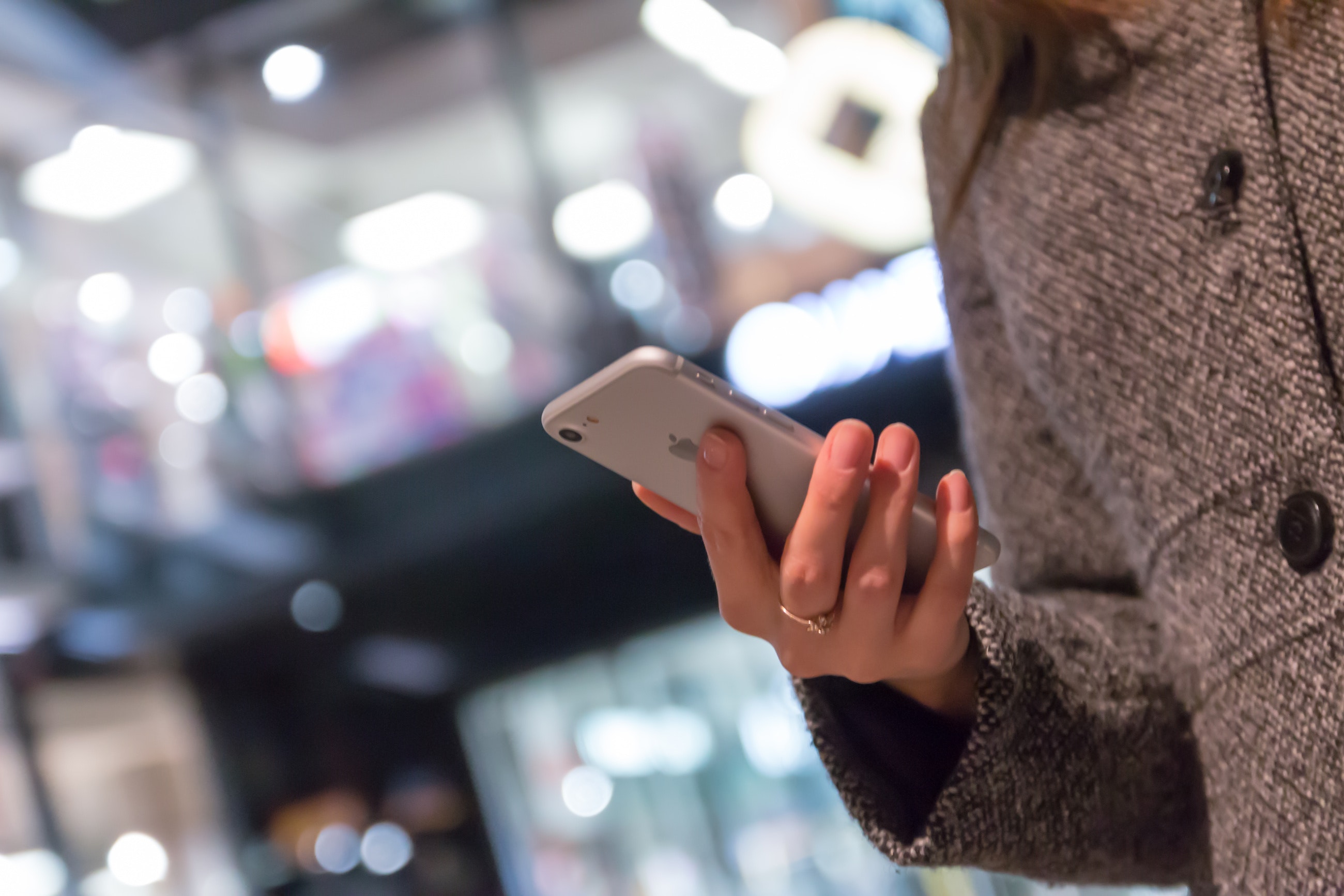 woman-looking-at-cell-phone