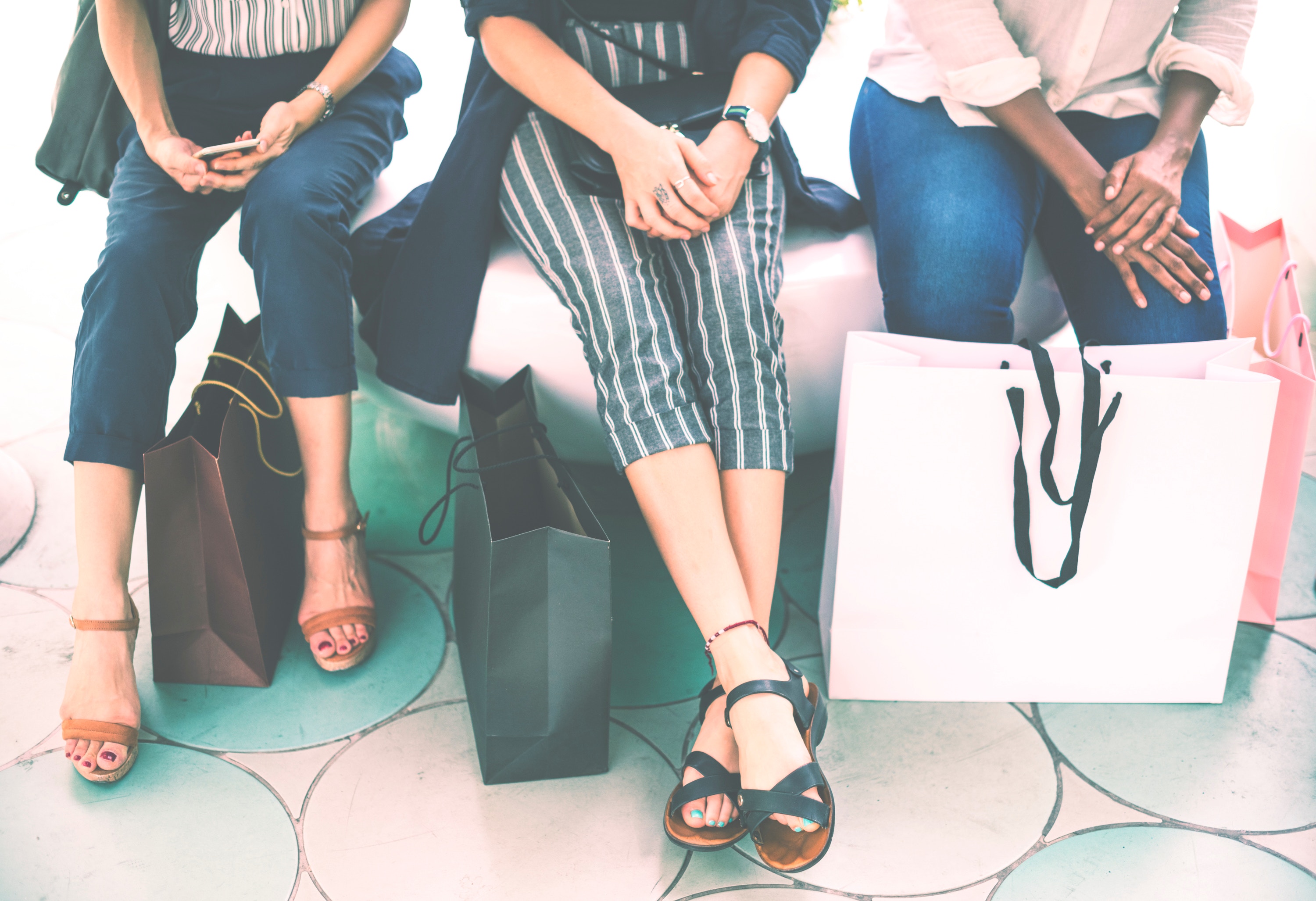 three-young-shoppers